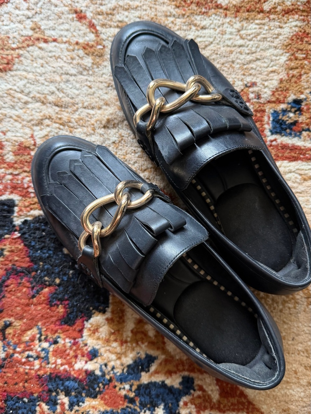 Women’s Black Leather Tassel Loafers with Gold Chain Accent